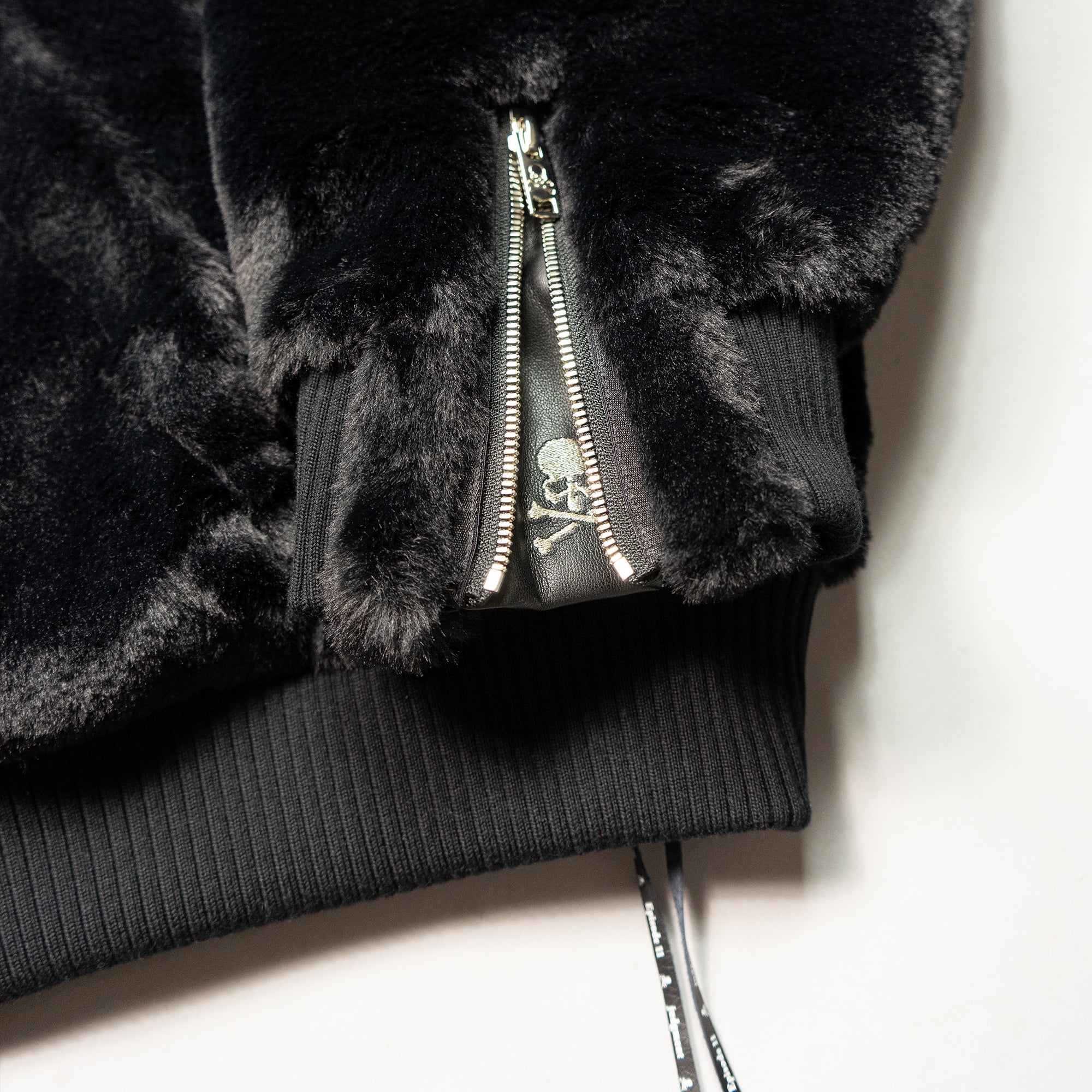 HOODED FUR JACKET WITH SWAROVSKI® DRAWSTRINGS