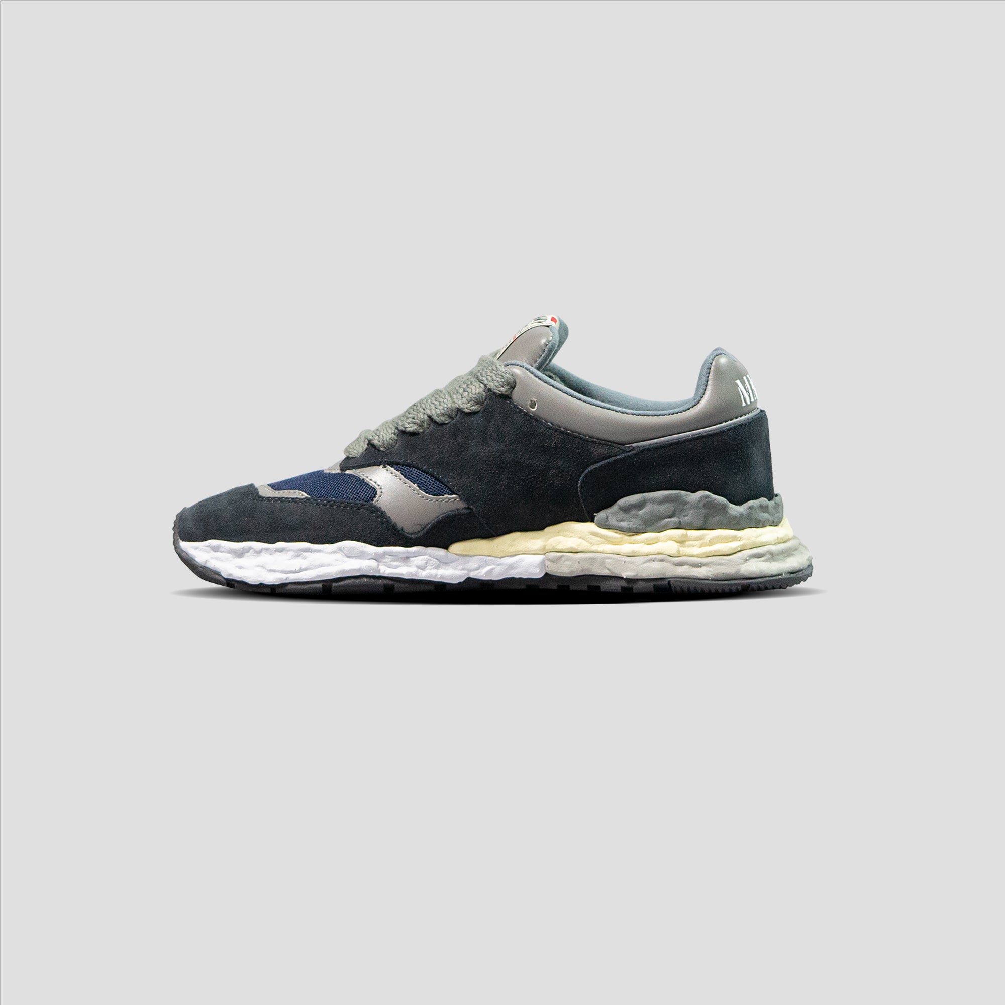 GEORGE OG SOLE LOW-TOP LEATHER SNEAKER