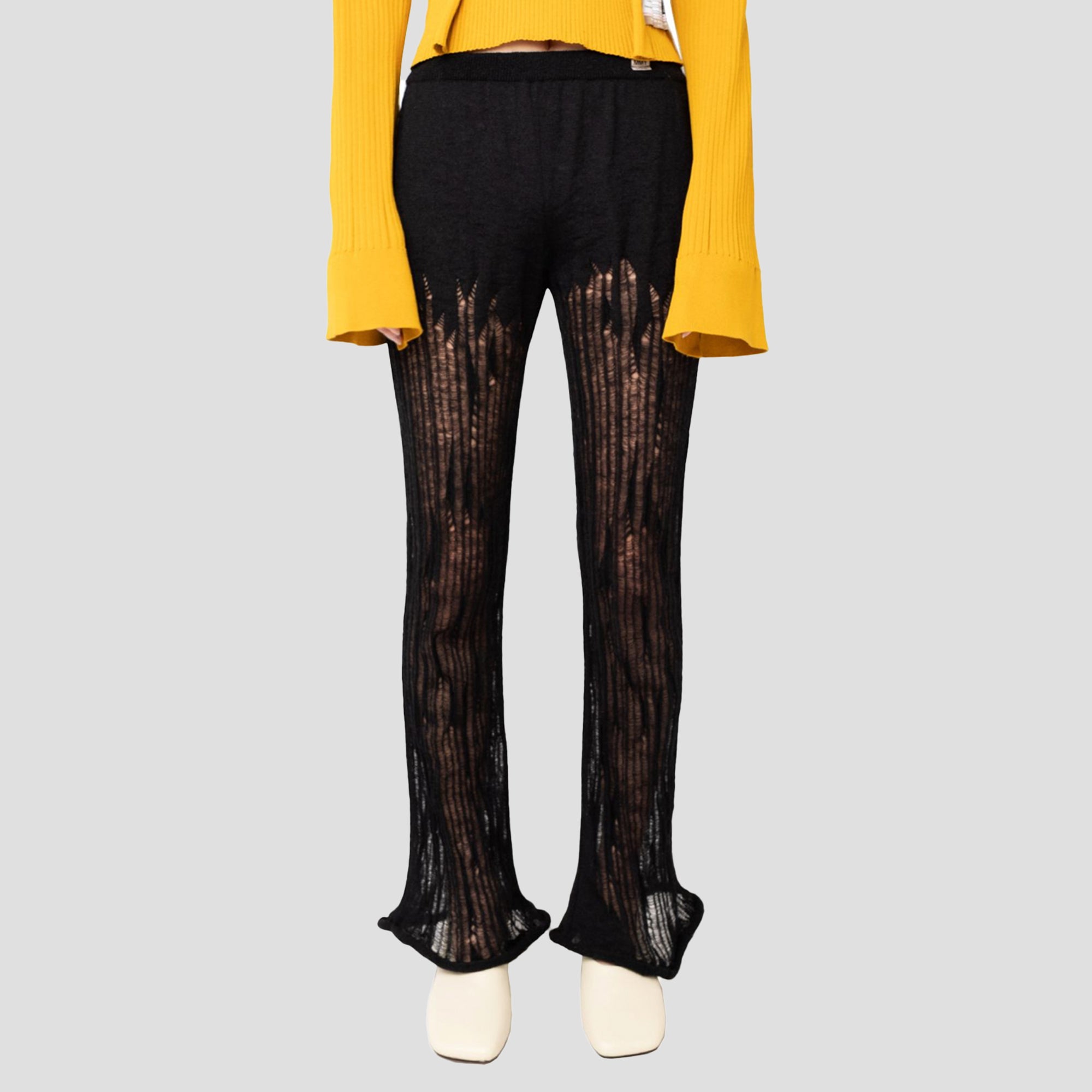 DISTRESSED FLARE PANTS