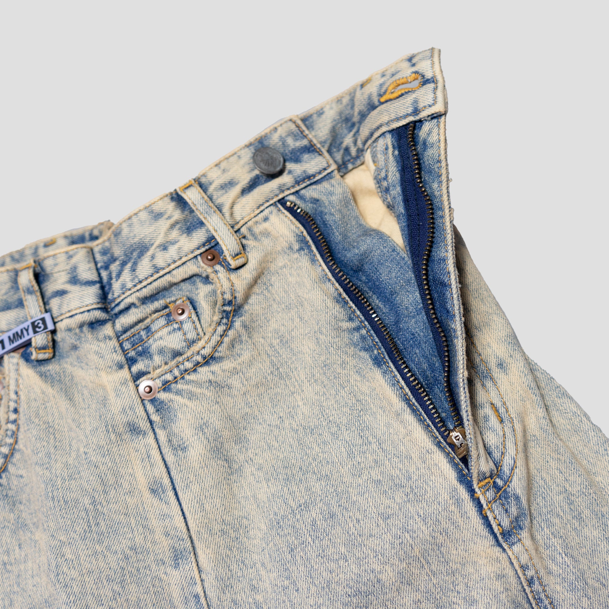 DECONSTRUCTED DENIM JEANS