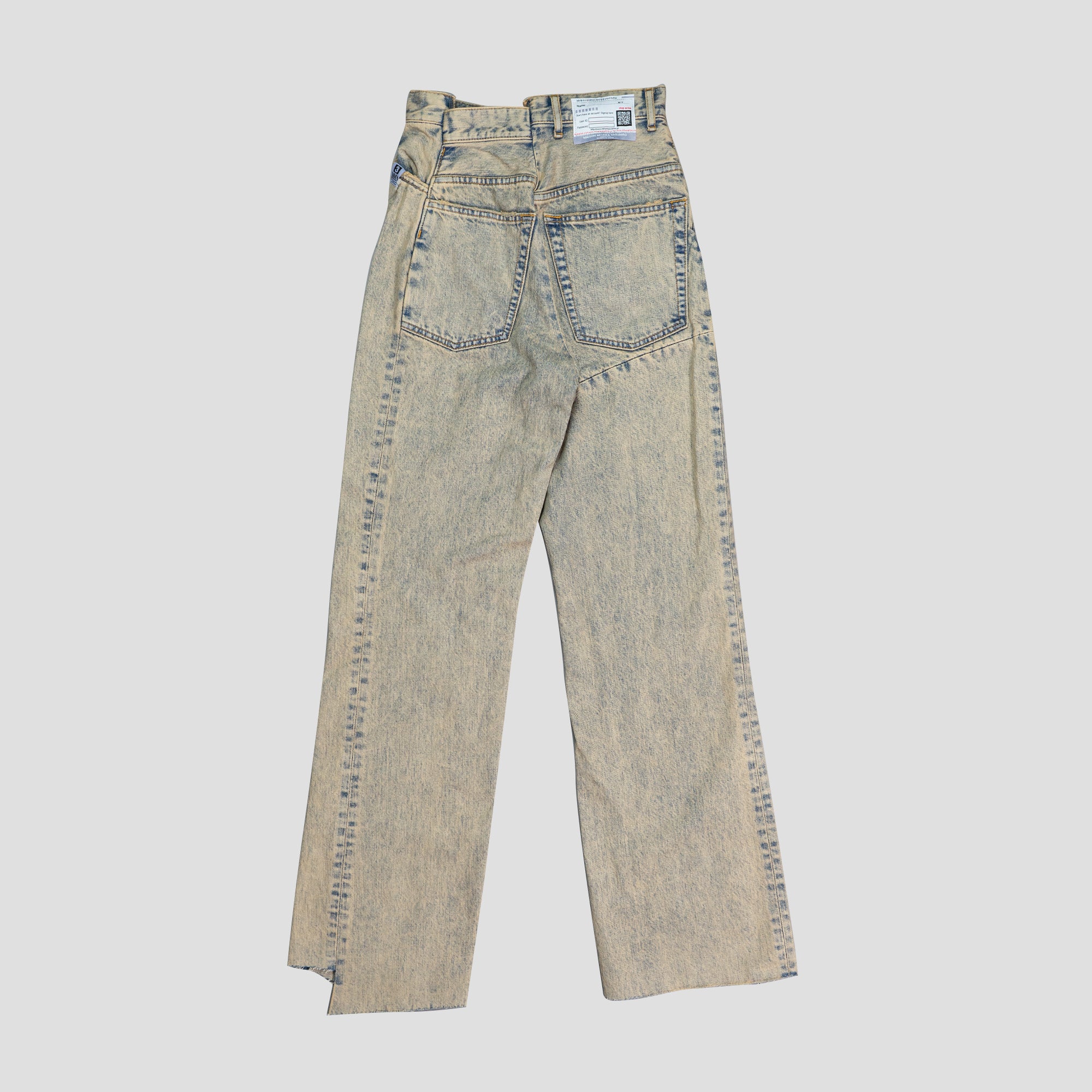 DECONSTRUCTED DENIM JEANS