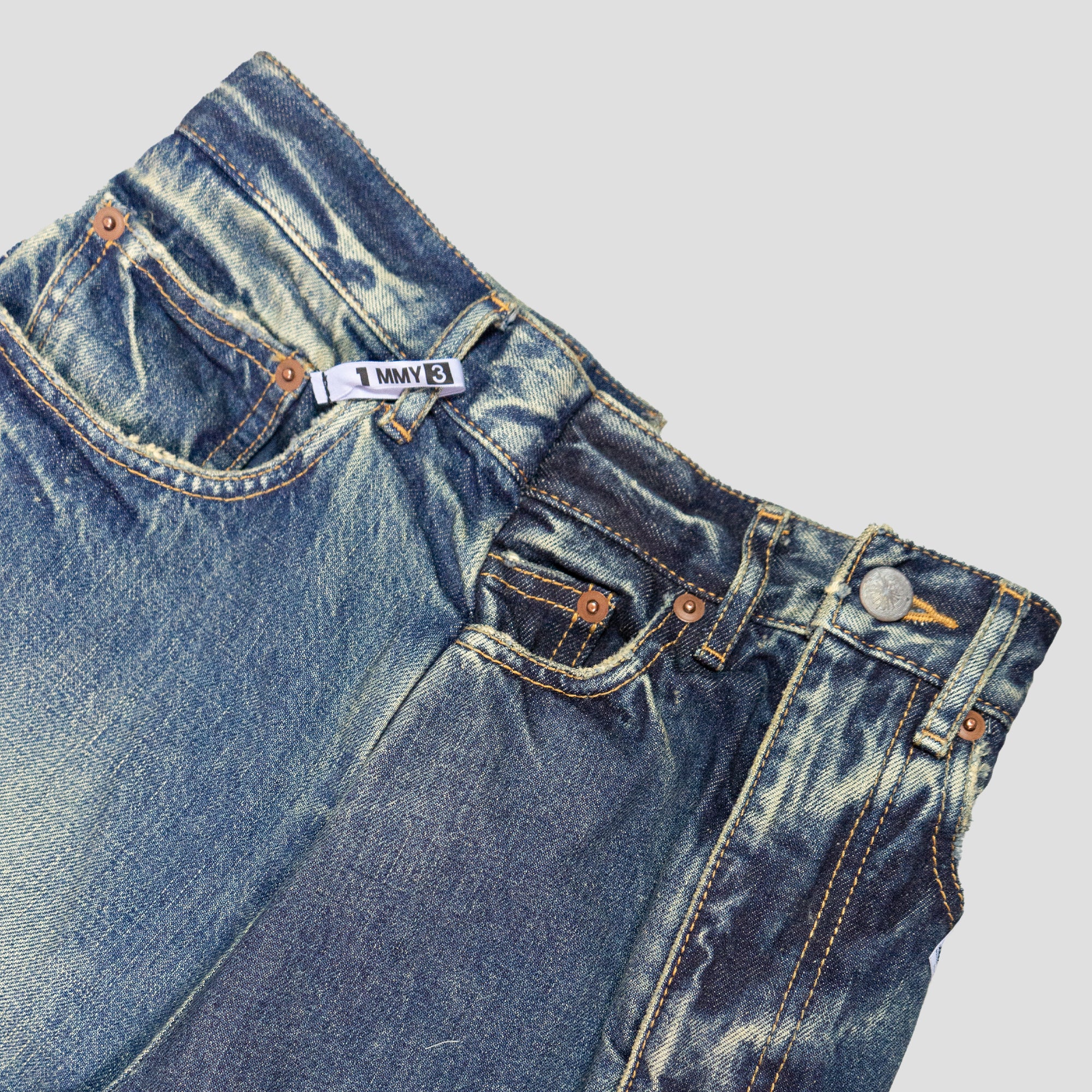 DECONSTRUCTED DENIM JEANS