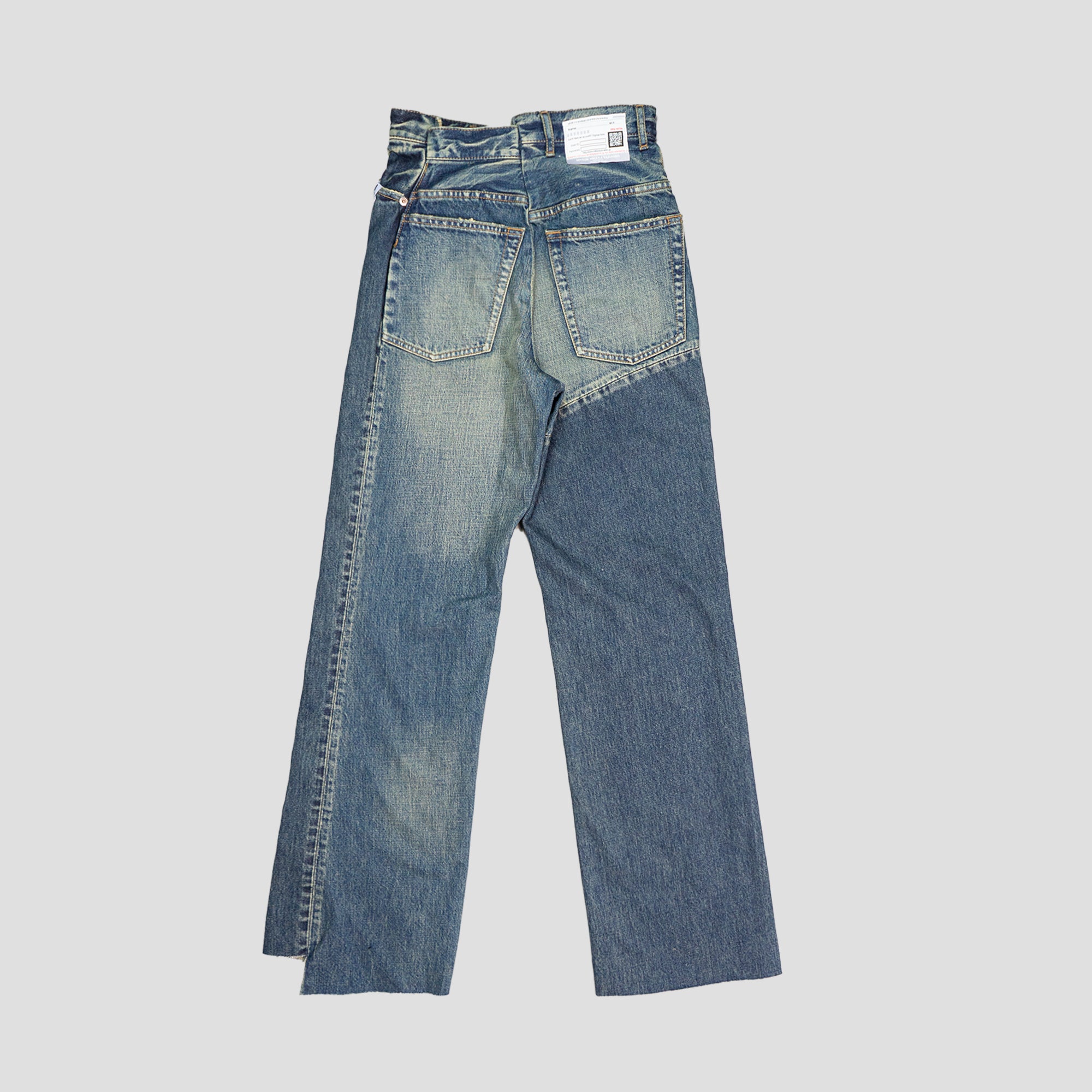 DECONSTRUCTED DENIM JEANS