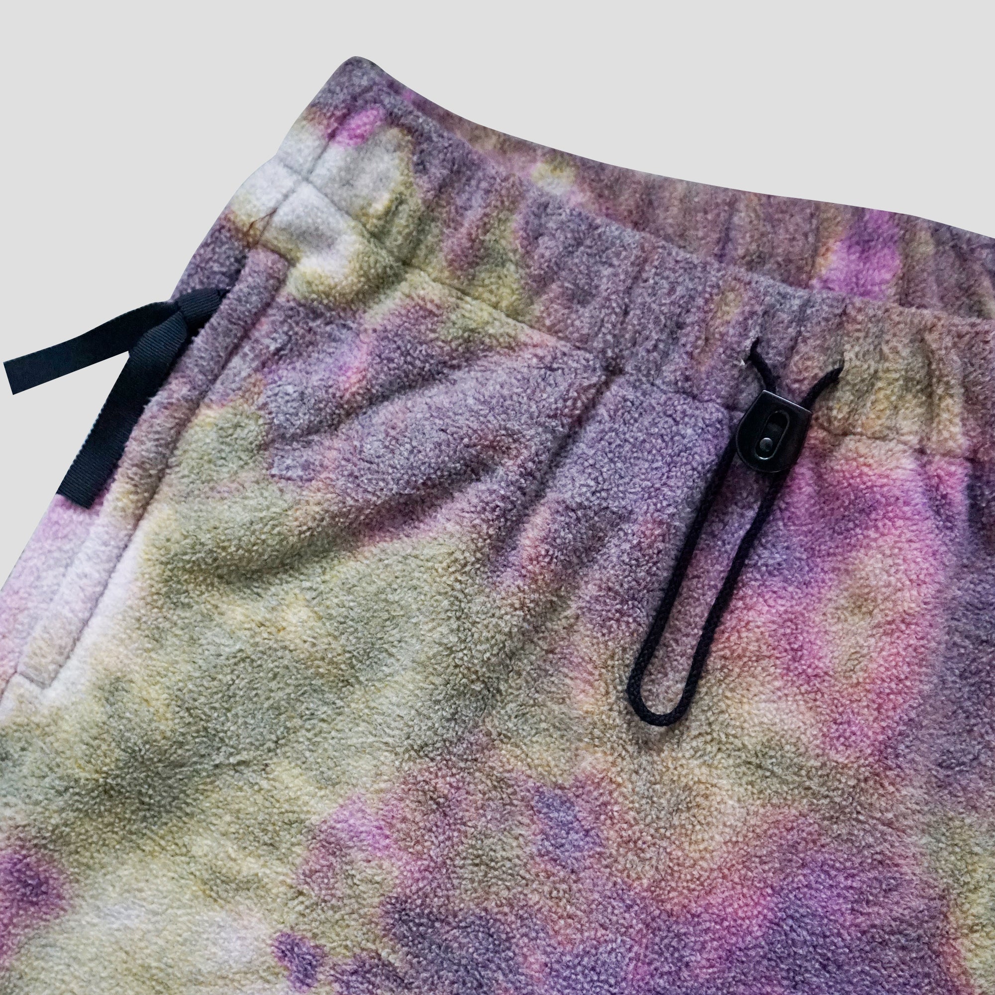 REVERSIBLE FLEECE TIE DYE FLARE PANTS - PURPLE/OLIVE