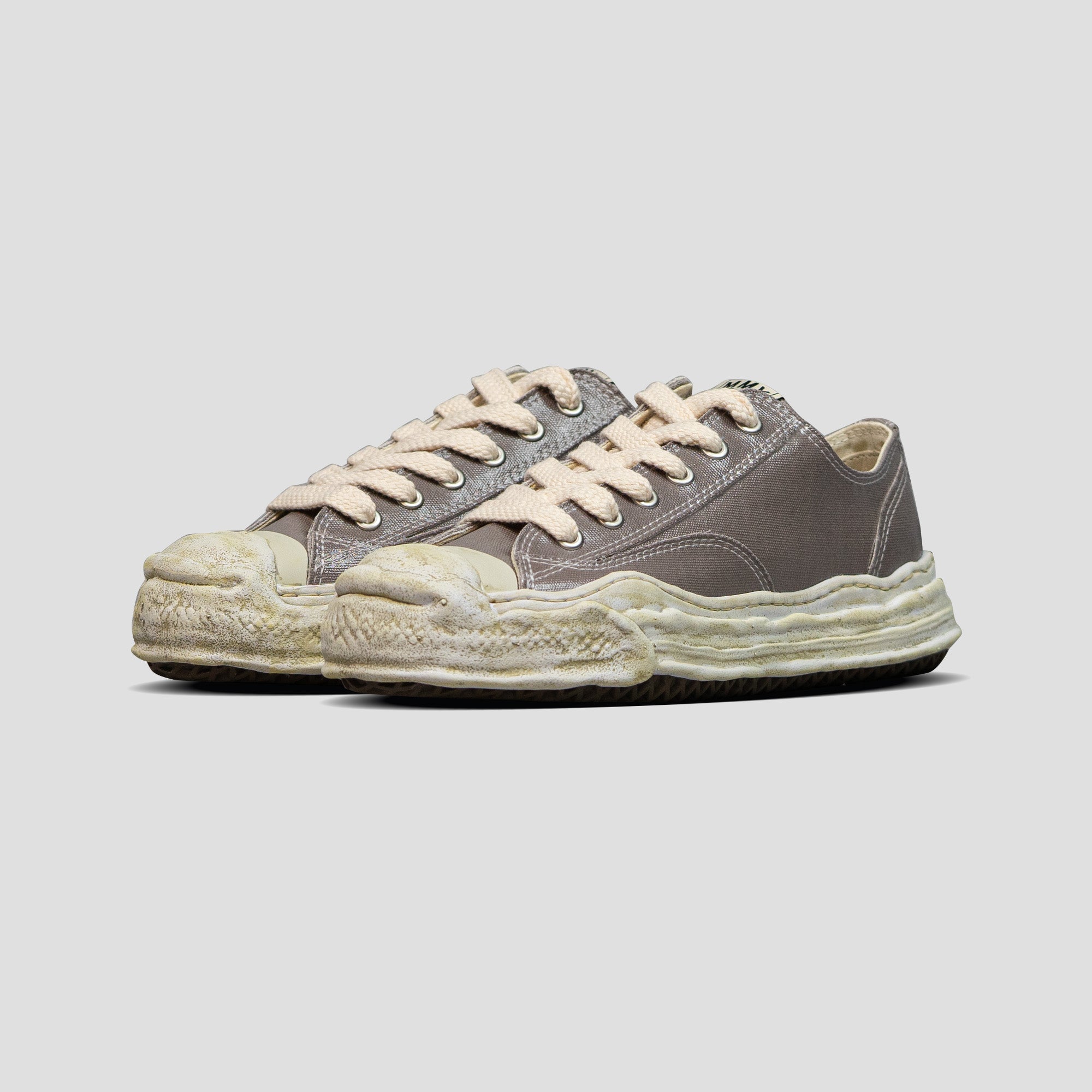 HANK OG SOLE LOW-TOP LAMINATED CANVAS SNEAKERS