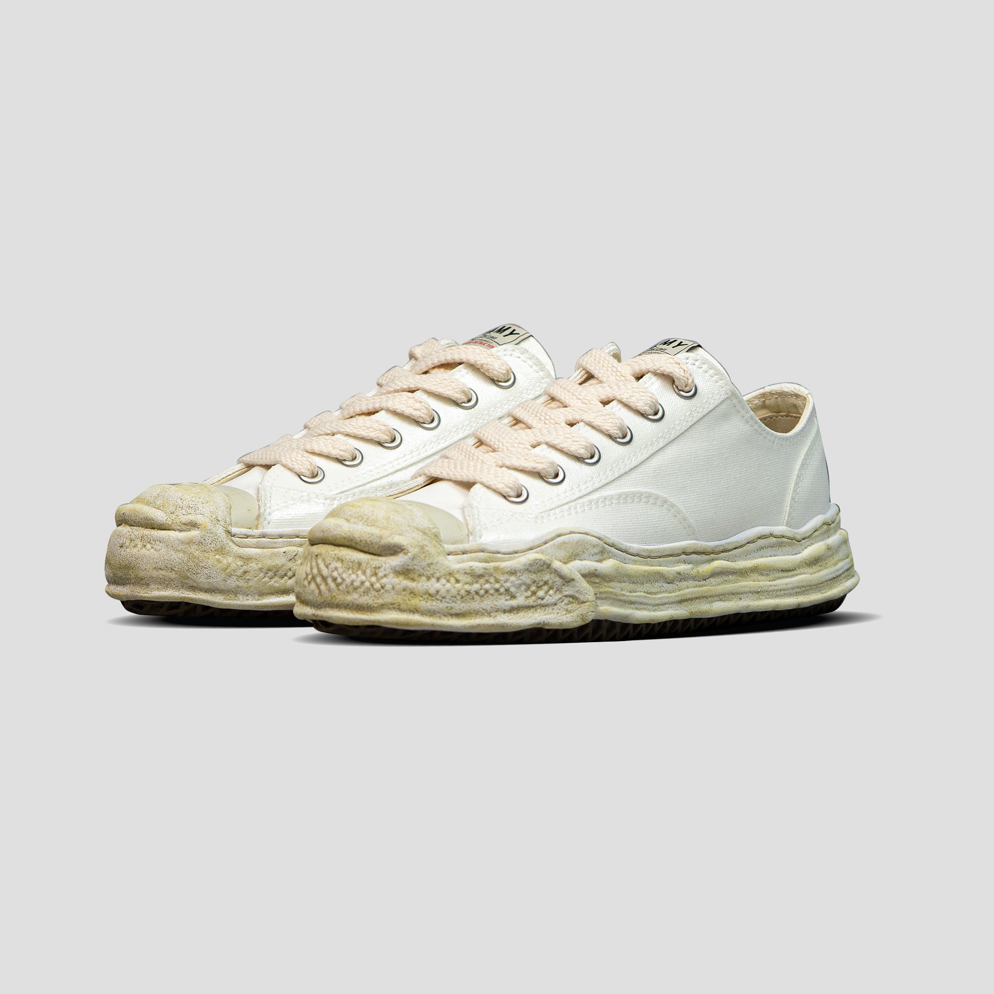 HANK OG SOLE LOW-TOP LAMINATED CANVAS SNEAKERS