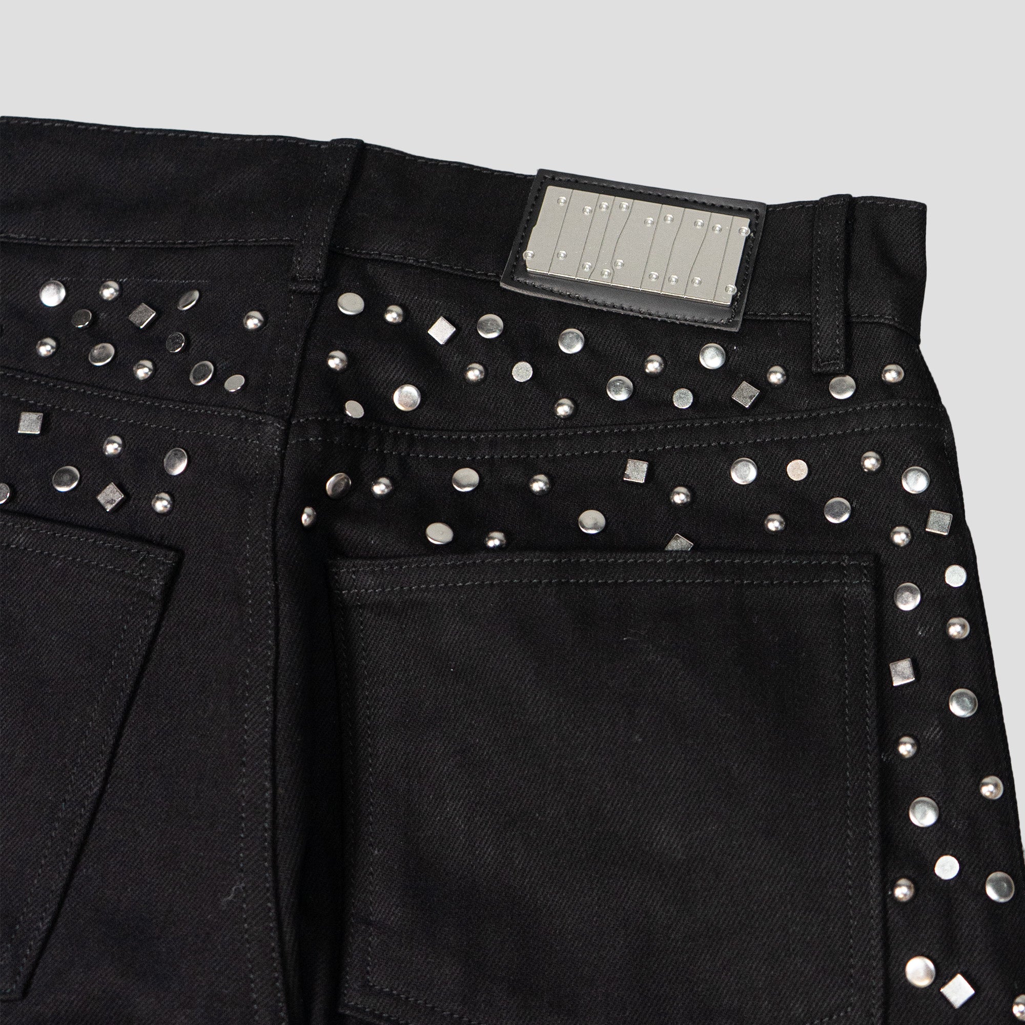 SPARKED STUDDED DENIM JEANS