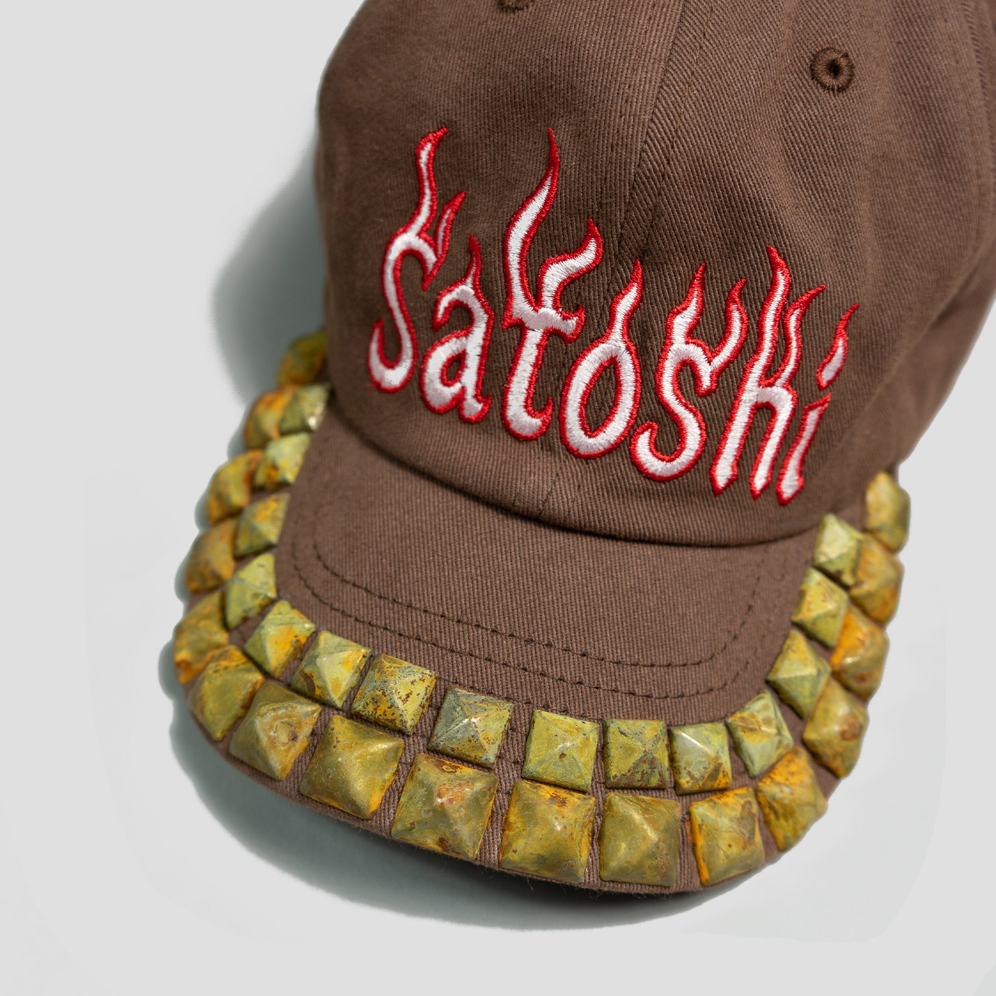 STUDDED FLAME CAP