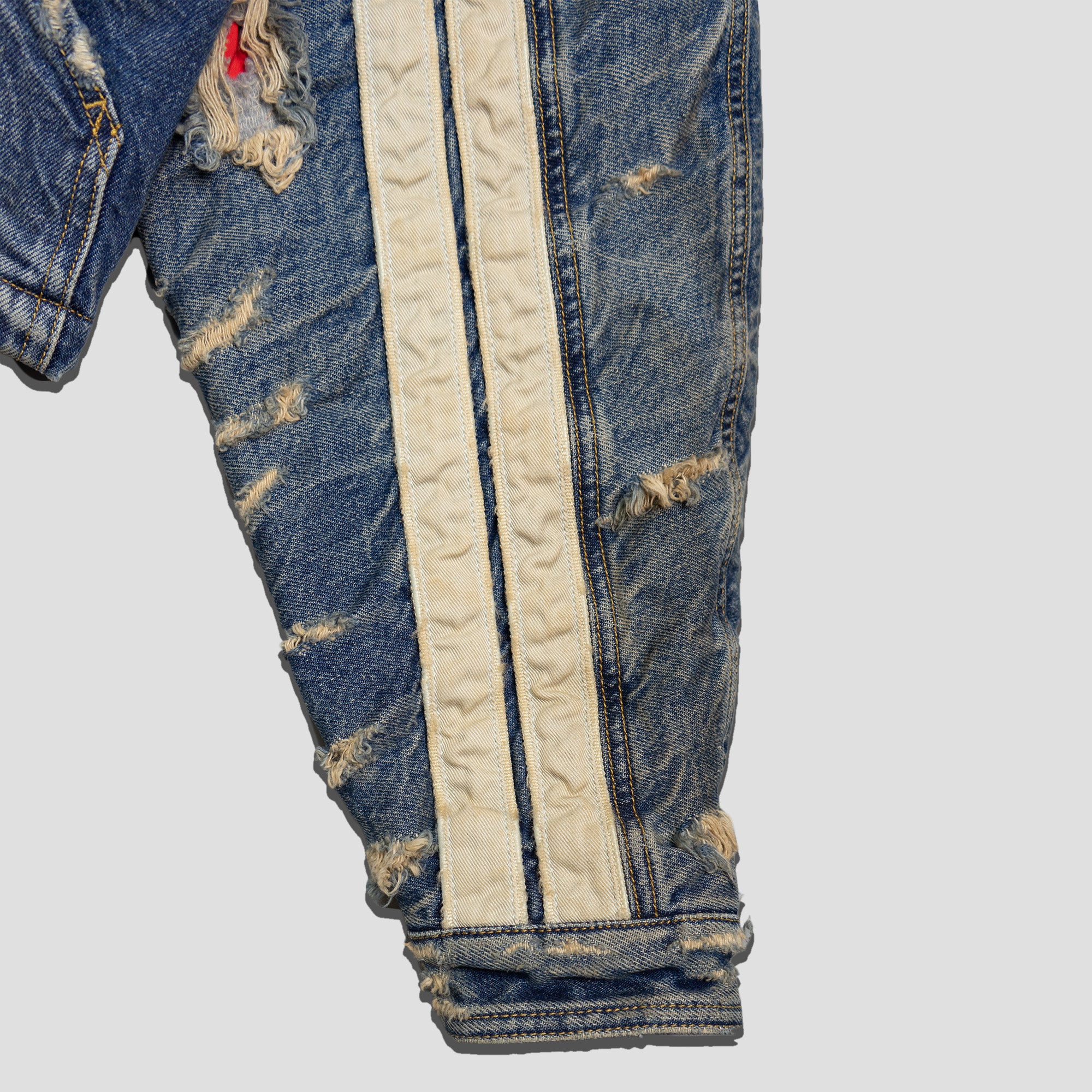 DENIM TRAPPIST TRUCKER JACKET