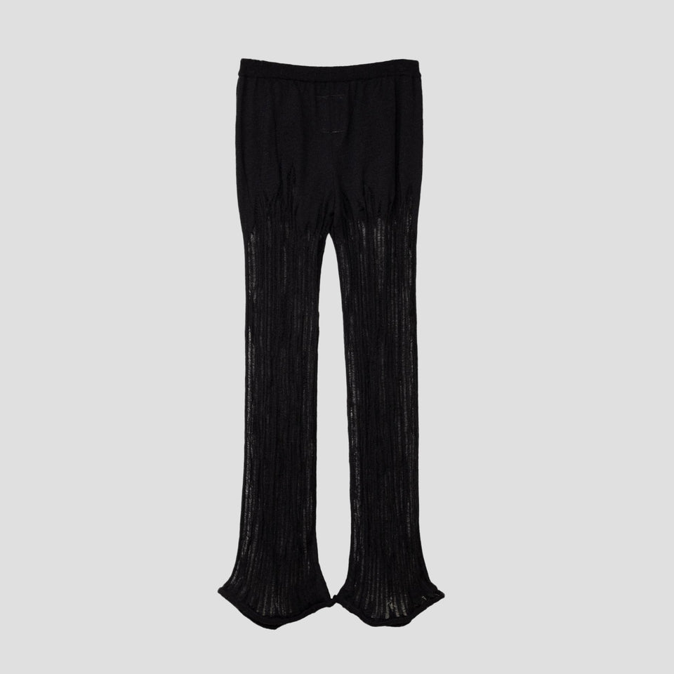 DISTRESSED FLARE PANTS